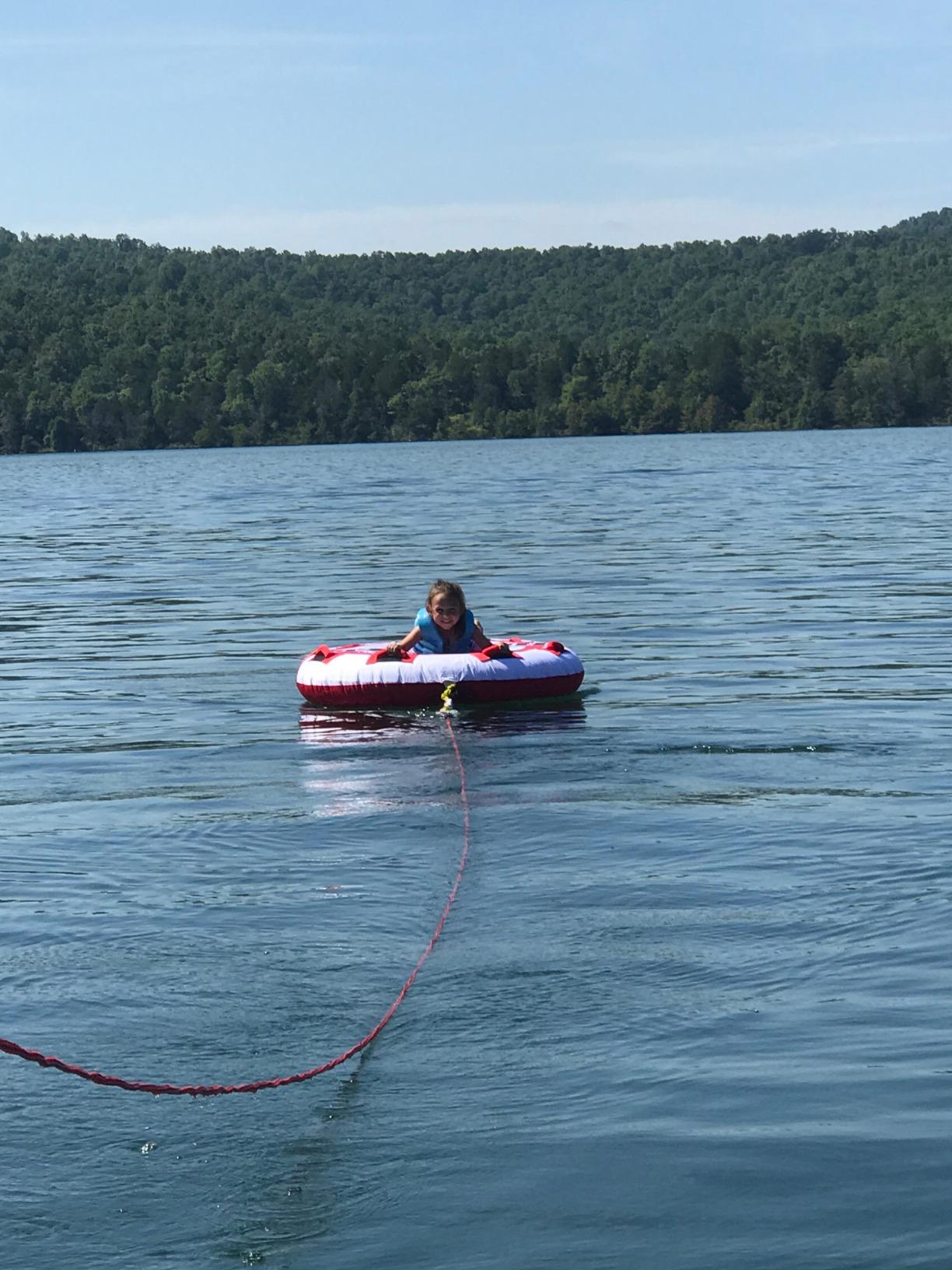 Airhead Hot Shot Towable Tube for Boating, 1-2 Rider Inflatable Boat Tube for Water Tubing, Round Deck for Air Time, Full Nylon Cover, Padded Handles with Neoprene Knuckle Guards, Speed Safety Valve customer photo 2