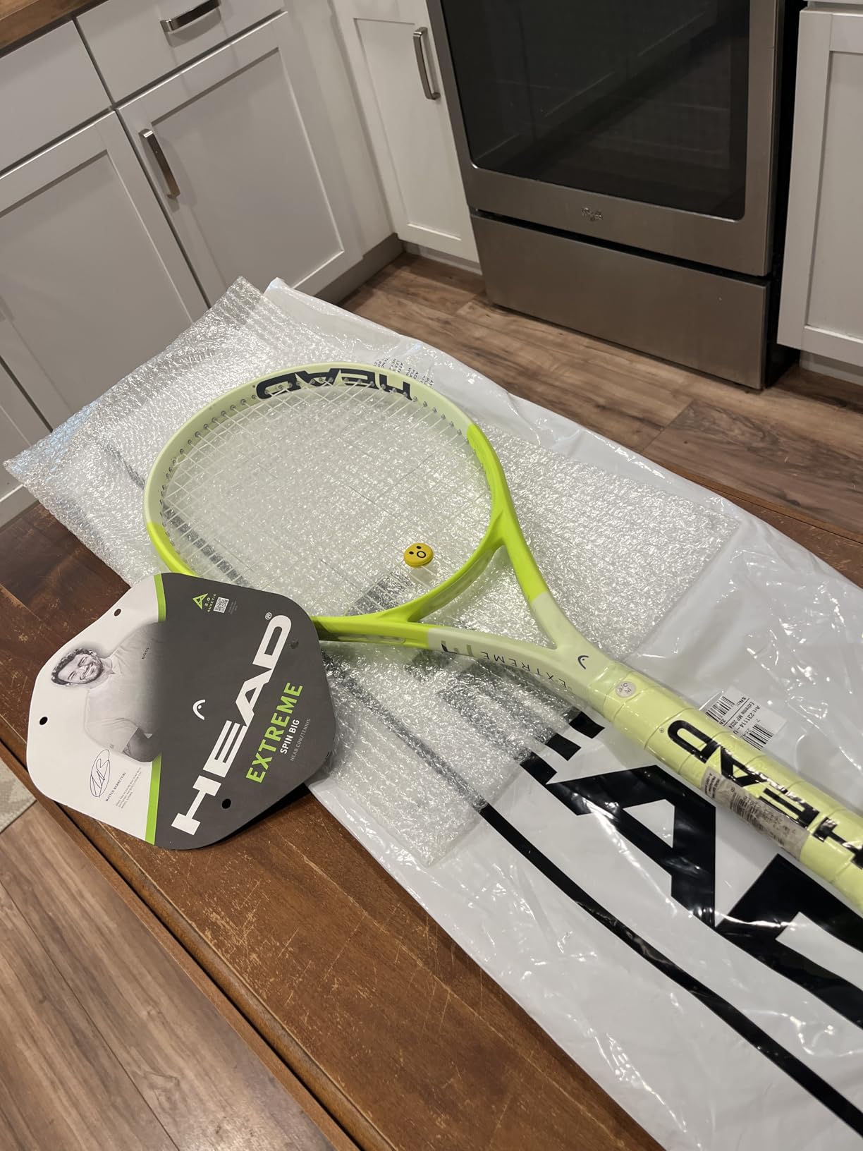 HEAD Extreme MP Tennis Racquet - Strung Mid Tension with Velocity 16 Gauge - 4 1/4