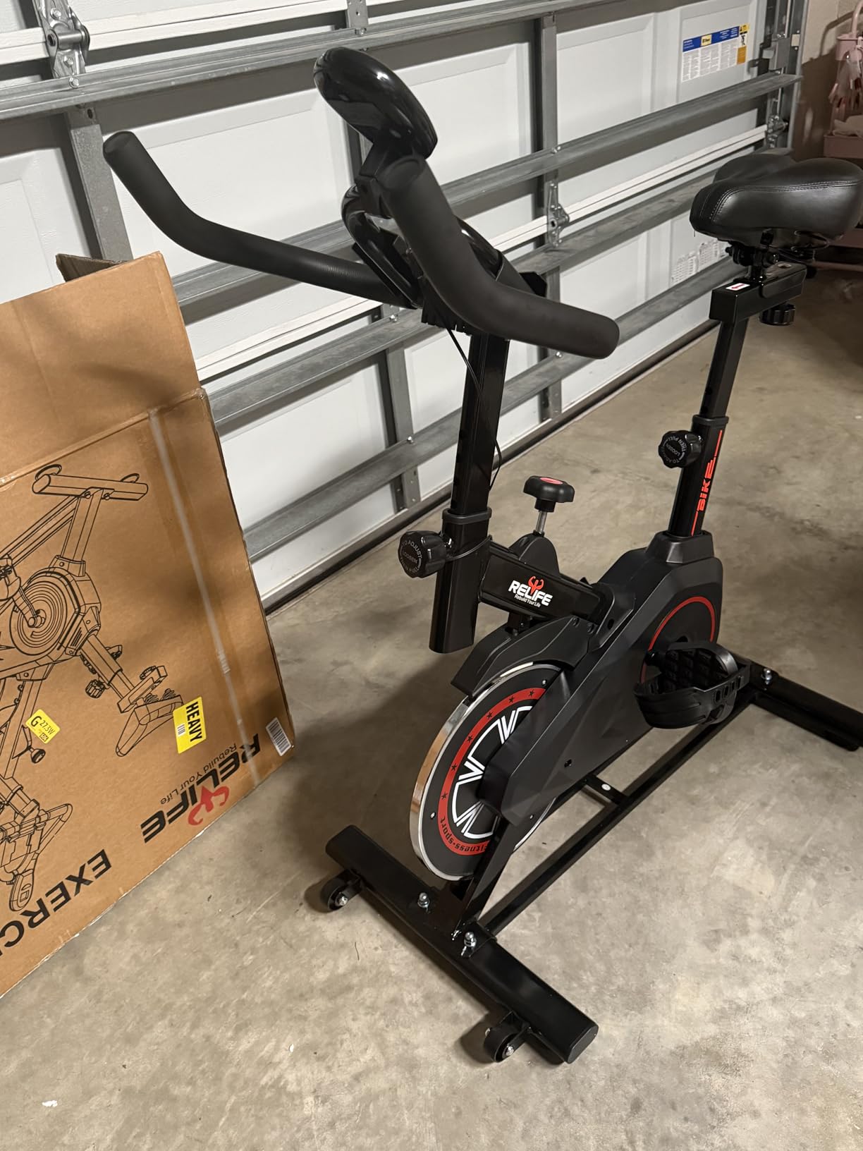RELIFE REBUILD YOUR LIFE Exercise Bike Stationary for Home Indoor,Cycling Bike with Silent Belt Drive for Home Cardio,Brake Pad Resistance with djustable & Comfort Seat/PAD Holder/LCD Monitor customer photo 2