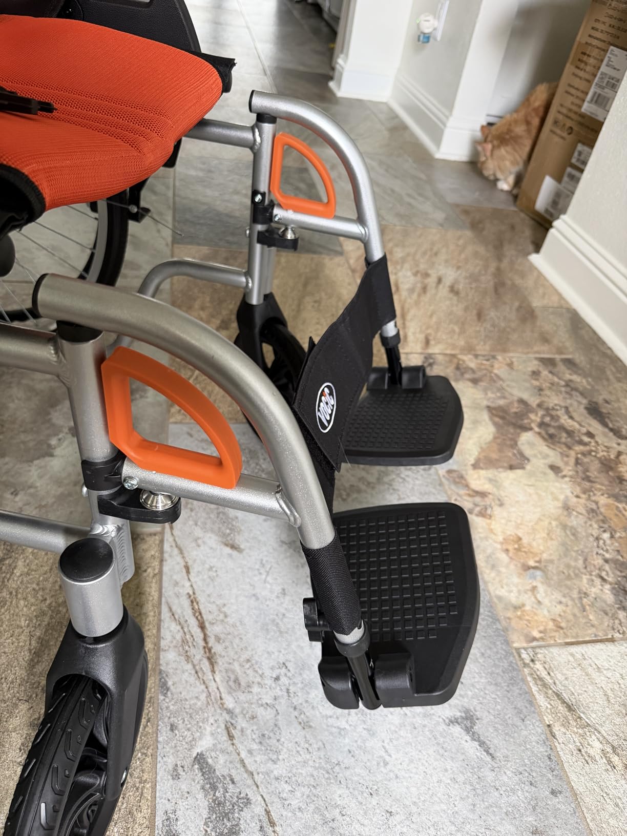 VOCIC Ultra Lightweight Wheelchair for Adults, 23lb Frame Portable Foldable Self-Propelled Wheelchairs for Seniors with Quick Release Wheels, Swing-Away Footrests, Flip-Back Arm, 300 lbs Orange customer photo 1