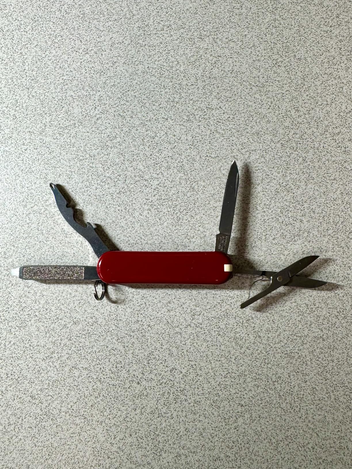 Victorinox Rambler Swiss Army Knife, Compact, 10 Functions, Swiss Made Pocket Knife with Magnetic Phillips Screwdriver, Scissors and Tweezers - Red customer photo 2