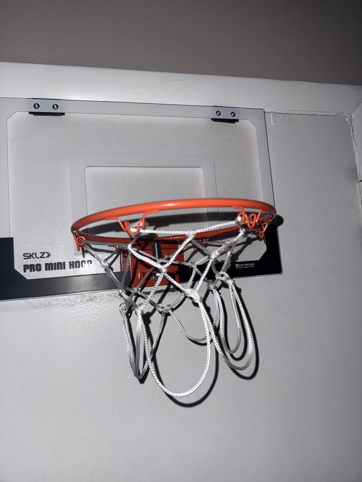 SKLZ Pro Mini Indoor Basketball Hoop with Ball, Over the Door, Shatter-Proof Backboard, Spring-Action Break-Away Steel Rim, Great for Home, Dorm Room, and Office customer photo 2