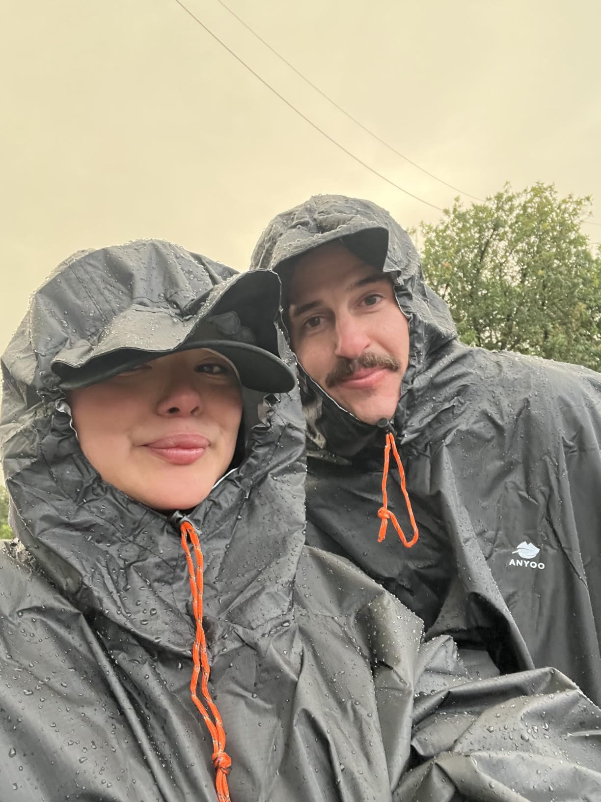ANYOO Hooded Rain Poncho for Adults Waterproof Lightweight Rain Coat for Men Women Reusable Rain Jacket for Emergency Outdoor customer photo 1