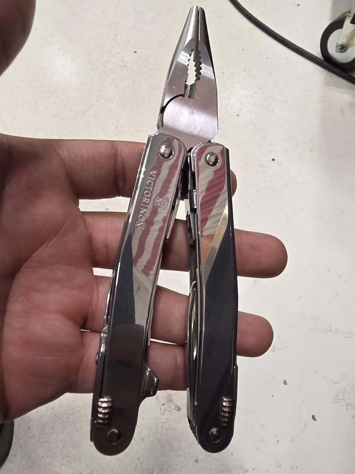 Victorinox Swiss Tool Spirit MX Clip Swiss Army Knife, 25 Function Swiss Made Multitool with Large Blade, Pliers and Wire Cutter - Silver customer photo 2