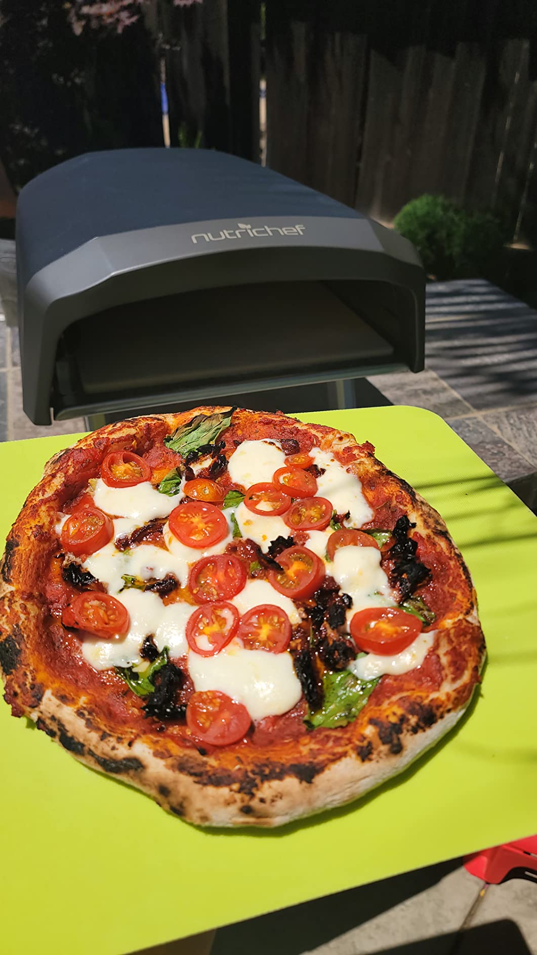 NutriChef Portable Outdoor Gas Pizza Oven - Unique Design, Easy Bake Oven with Pizza Stone, Foldable Feet, One-Touch Gas Ignition, Adjustable Heat Control, Stainless Steel, 932F Max customer photo 1