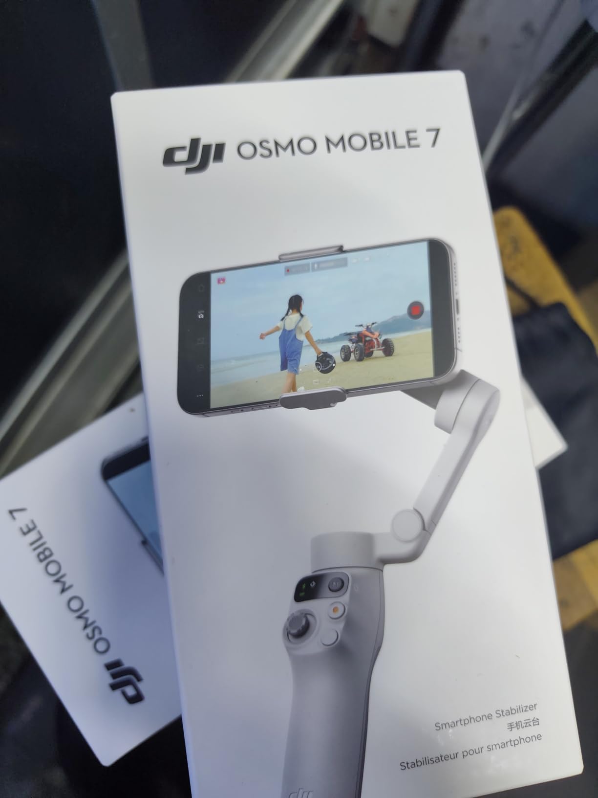 DJI Osmo Mobile 7 Gimbal Stabilizer for iPhone & Android, 3-Axis Gimbal | Built-in Tripod, Ultra-Light, Comfortable Grip, ActiveTrack 7.0, One-Tap Edit, 10hrs Use, Phone Charging customer photo 1