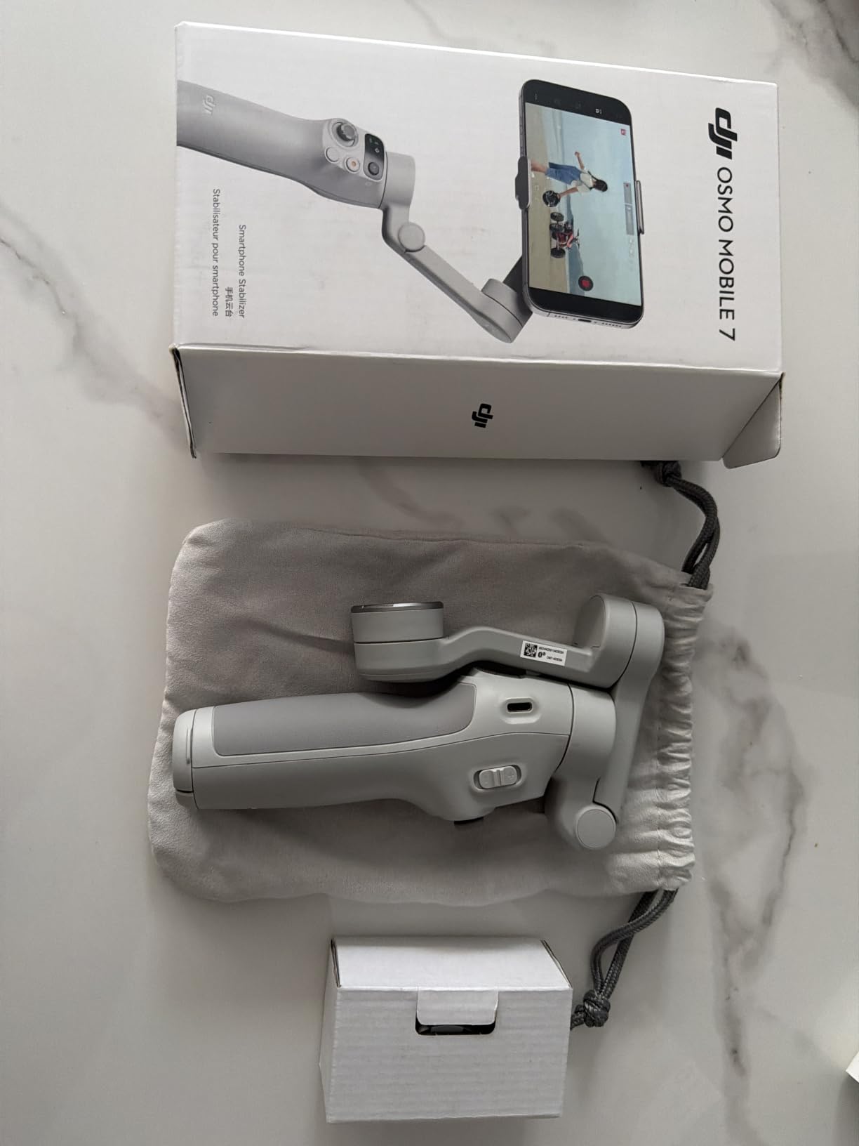 DJI Osmo Mobile 7 Gimbal Stabilizer for iPhone & Android, 3-Axis Gimbal | Built-in Tripod, Ultra-Light, Comfortable Grip, ActiveTrack 7.0, One-Tap Edit, 10hrs Use, Phone Charging customer photo 2