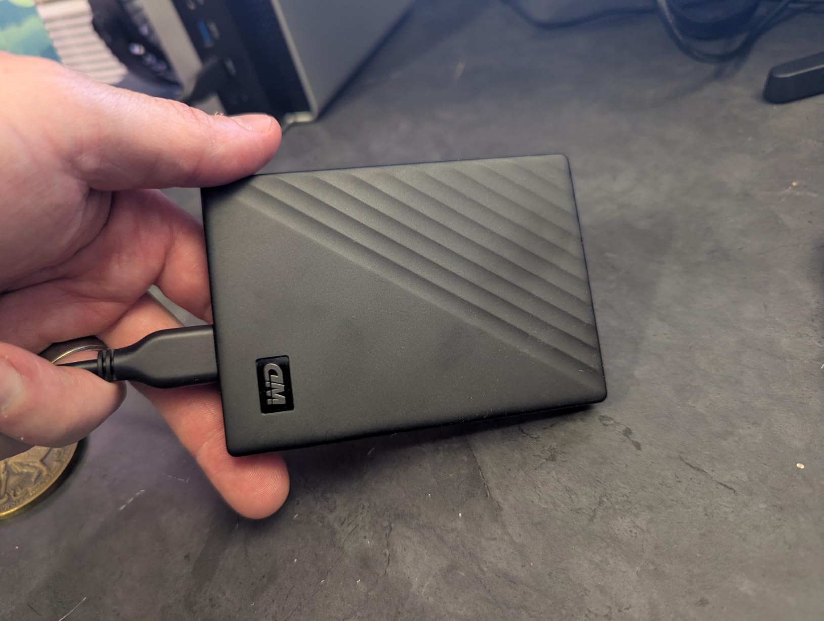 WD 2TB My Passport, Portable External Hard Drive, Black, backup software with defense against ransomware, and password protection, USB 3.1/USB 3.0 compatible - WDBYVG0020BBK-WESN customer photo 1