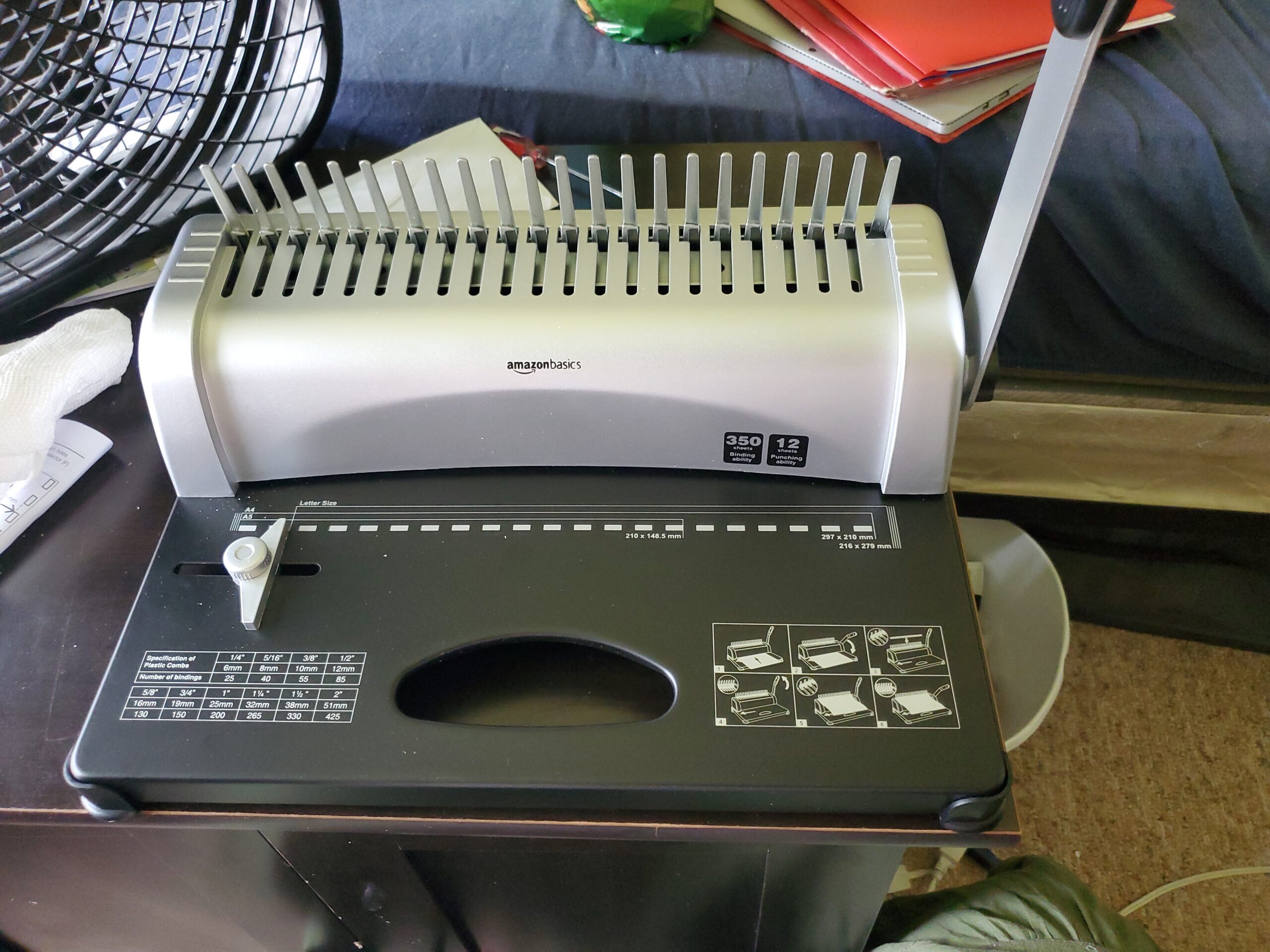 Amazon Basics Comb Binding Machine, 350 Sheets Capacity, Punches 12 Sheets, for Paper Sizes A5(15 holes)/Letter(19 holes)/A4(21 holes) with Adjustable Margin, Grey customer photo 2