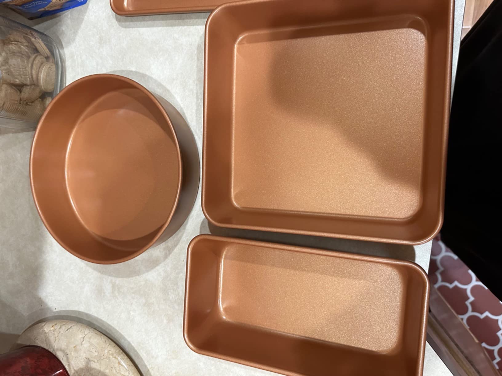 Amazon Basics Ceramic Nonstick Cookware Set, Induction Ready, Dishwasher & Oven Safe, Even Heating, 10-Piece Set with Frying Pans, Saucepans, Glass Lids, Copper Color customer photo 1