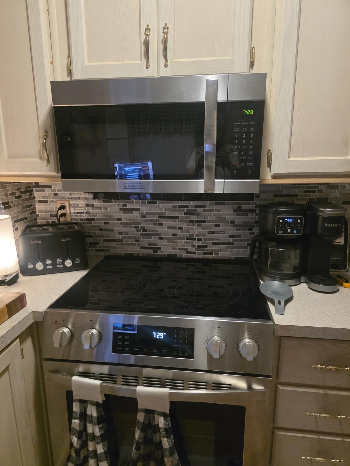 Empava 1.7 Cu.Ft. Over-the-Range Microwave, 1000W, Silver, EMPV-30OTR01 | Sensor cooking, auto menus, 2-speed 300 CFM venting fan, 10 power levels, turntable function, bright cooktop LED lighting customer photo 1