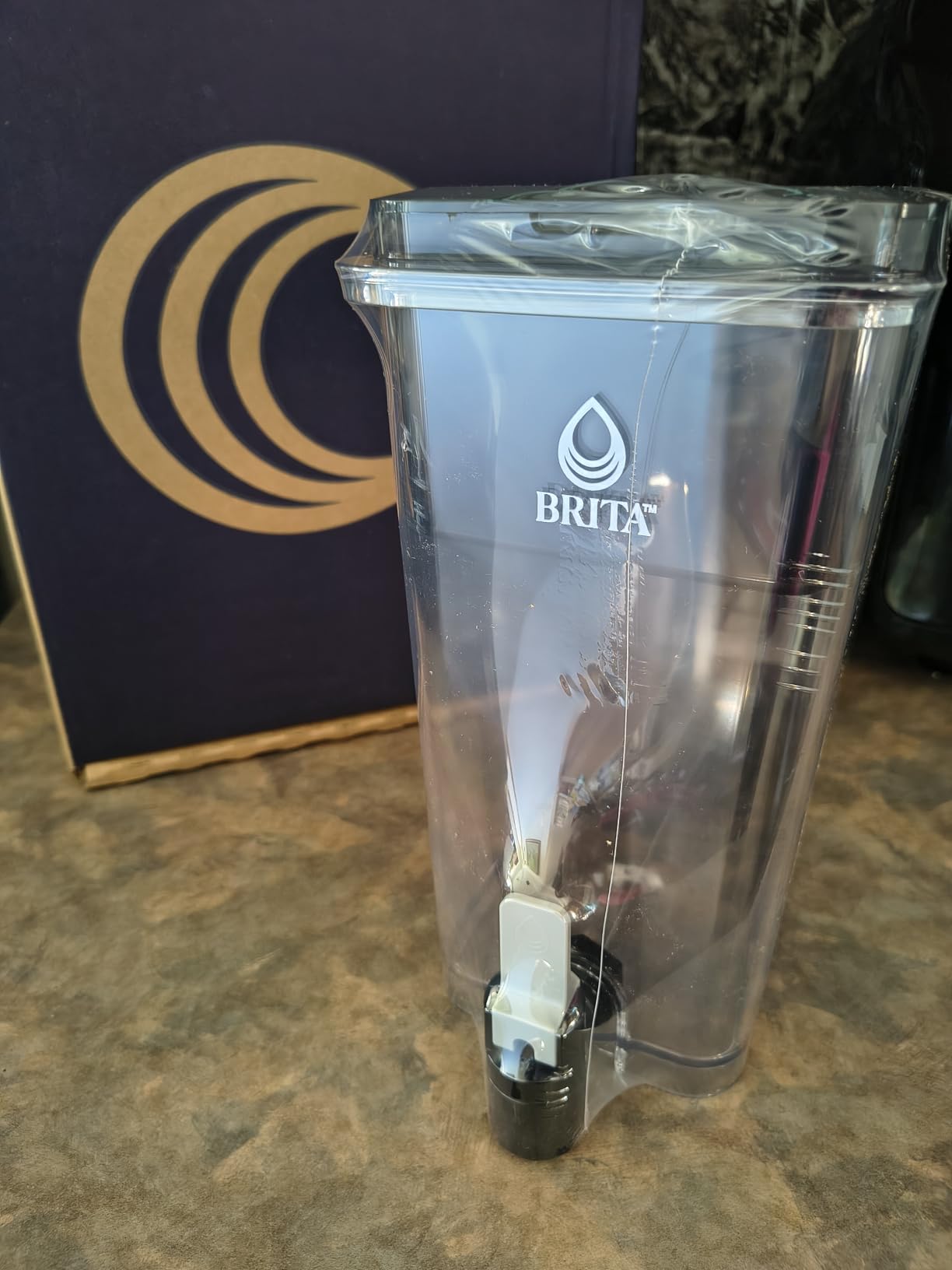 Brita Extra-Large 27-Cup Water Dispenser with BritaPlus Filter, WQA NSF/ANSI Certified, Reduces 2X Contaminants vs. Standard, Reduces Chlorine, Zinc, Copper, Mercury & More, 1 Filter Included, Black customer photo 1
