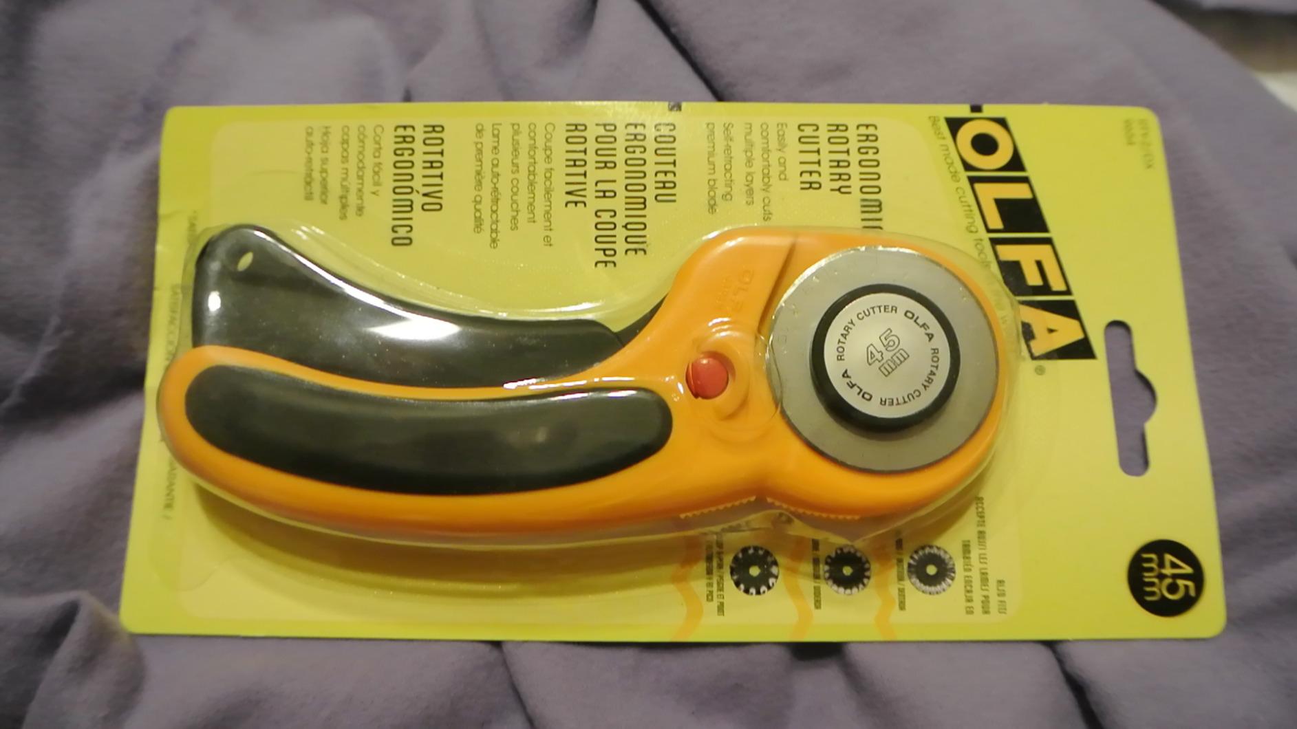 OLFA 45mm Ergonomic Squeeze-Handle Rotary Cutter (RTY-2/DX) - Auto-Retract | 45mm endurance tungsten steel, squeeze trigger auto-retract - High-volume quilting - Quilters and Crafters customer photo 1