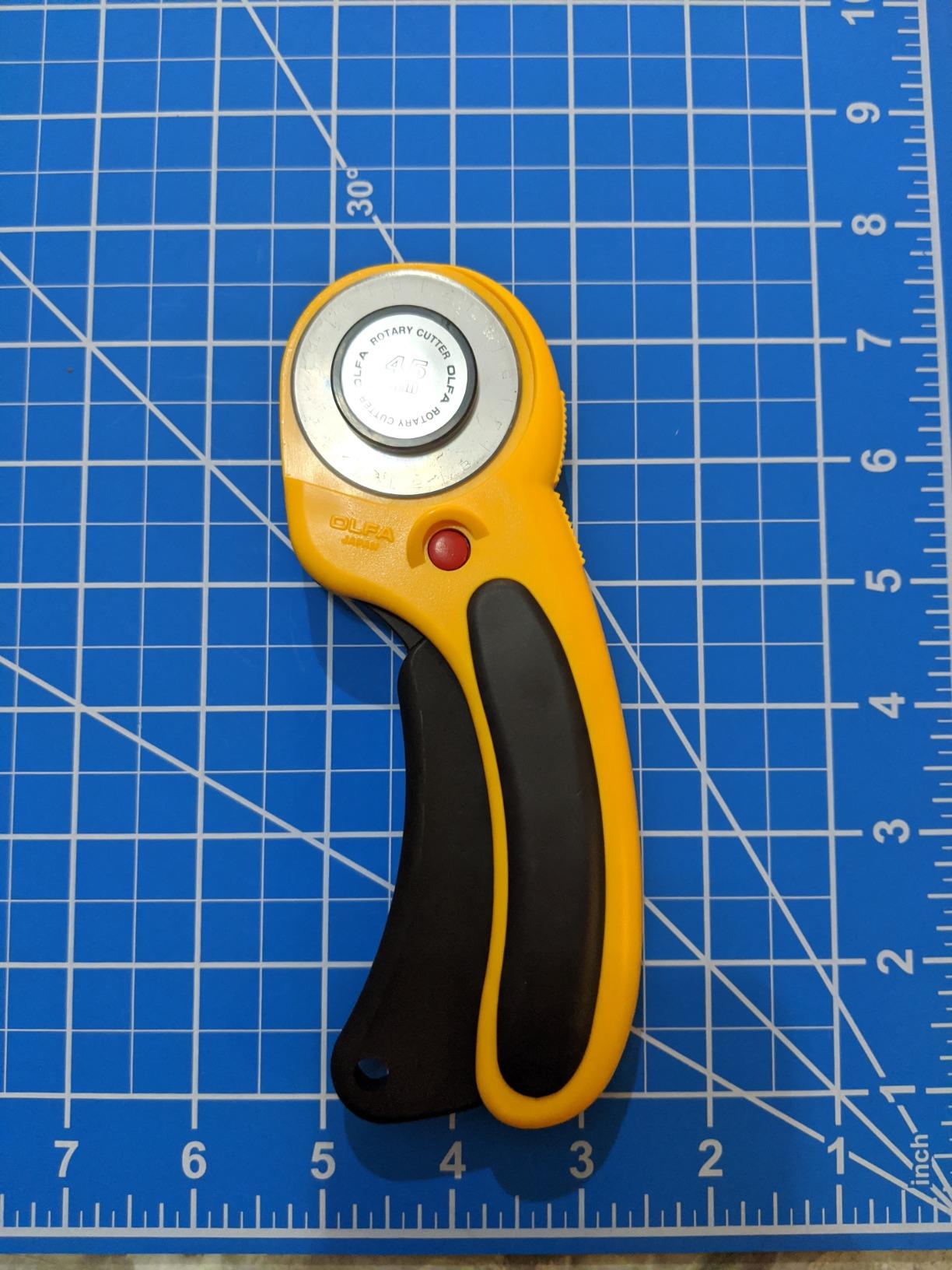 OLFA 45mm Ergonomic Squeeze-Handle Rotary Cutter (RTY-2/DX) - Auto-Retract | 45mm endurance tungsten steel, squeeze trigger auto-retract - High-volume quilting - Quilters and Crafters customer photo 2