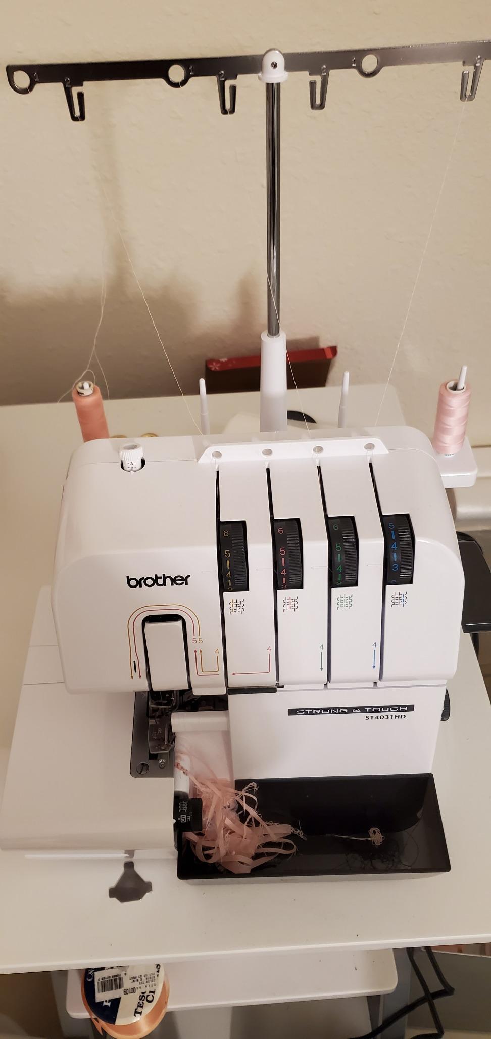Brother ST4031HD Serger, Strong & Tough Serger, 1,300 Stitches Per Minute, Durable Metal Frame Overlock Machine, Large Extension Table, 3 Included Accessory Feet, 12.99 x 14.37 x 17.01 in., White customer photo 2
