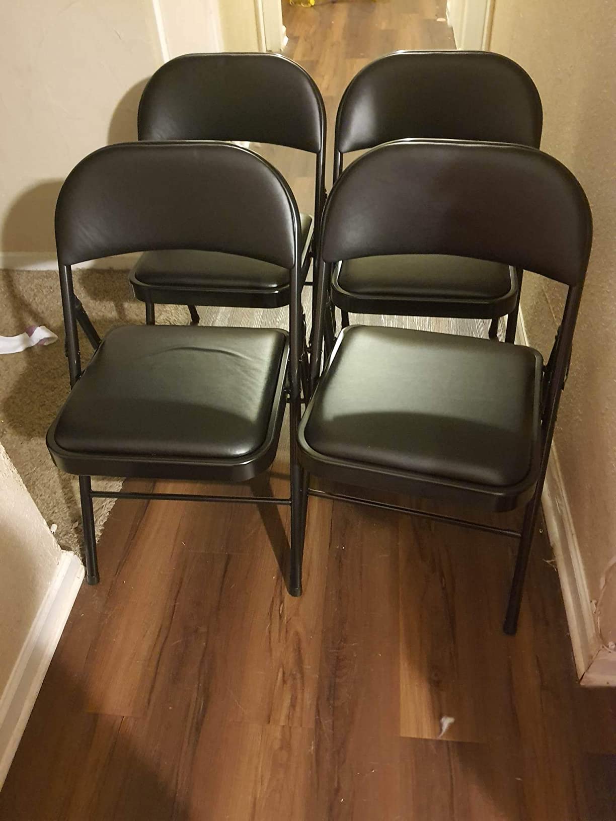 Amazon Basics Comfortable Vinyl-Padded Metal Steel Folding Chairs for Events, Easy to Fold and Store, Black, 4-Pack customer photo 2