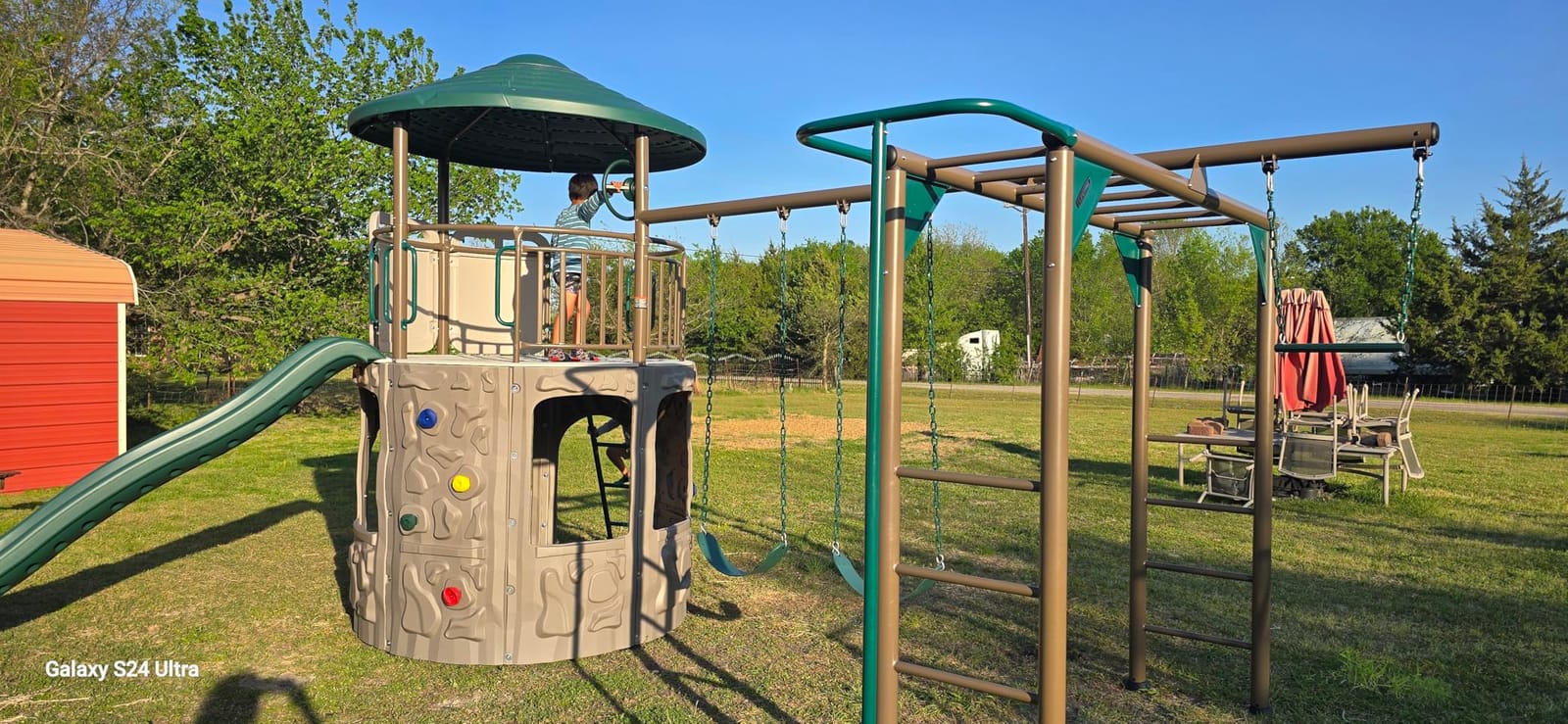 Lifetime Adventure Tower Deluxe Swing Set Playset Lifetime Adventure Tower, Covered Clubhouse, 9 ft Wavy Slide, Monkey Bars, Climbing Wall, Fireman's Pole, Belt Swings & Trapeze customer photo 2