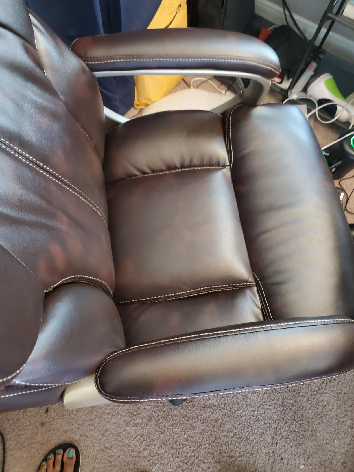 Amazon Basics Executive High Back Office Chair, Adjustable Height, Tilt, Swivel, Padded Seat, Bonded Leather, Wheels, Black/Silver customer photo 1