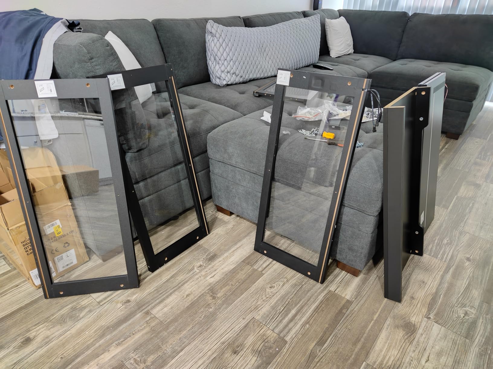 BROTTAR Display Cabinet with Glass Doors, 4-Tier Curio Cabinet with 3 Color Lights for Collectibles, Glass Display Case with Human Body Sensor, Bookcase with 4 Shelves, Storage Cabinets, Black customer photo 1