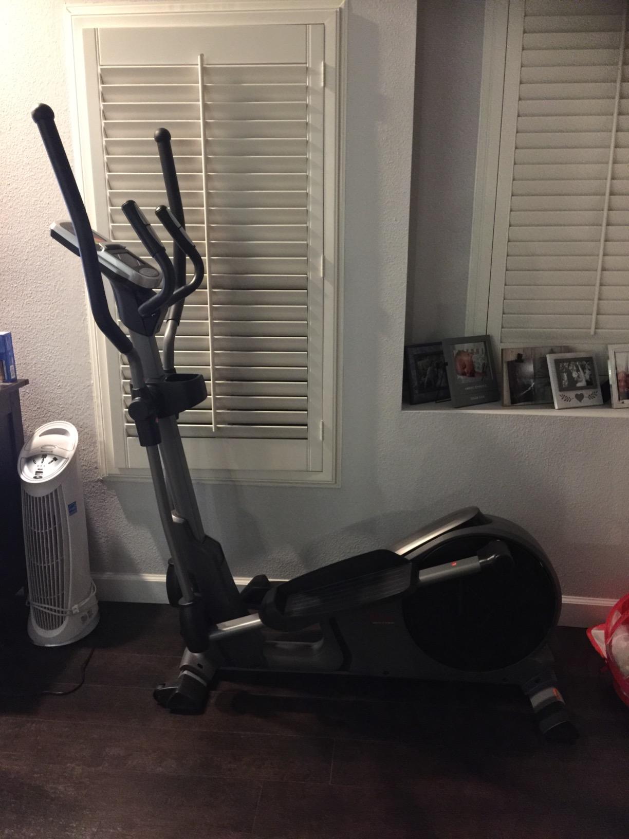Sunny Health & Fitness Heavy Duty Elliptical Machine with Full Body Workout | Adjustable Resistance, Dual Handlebar, Performance Monitor, Device Holder, Heart Rate Monitor, 300LB-330 LB Capacity customer photo 2