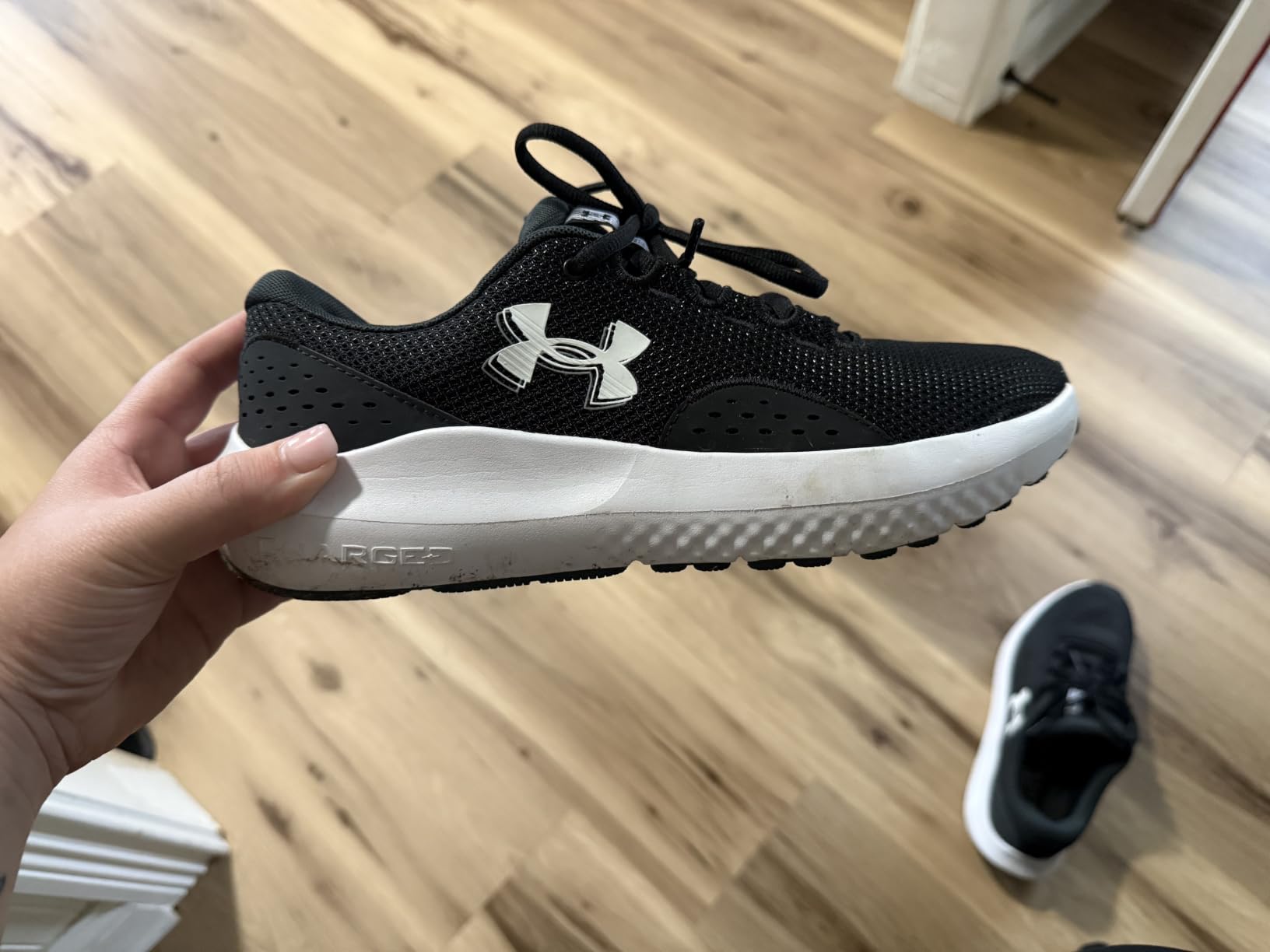 Under Armour Women's Charged Surge 4 Running Shoe customer photo 1