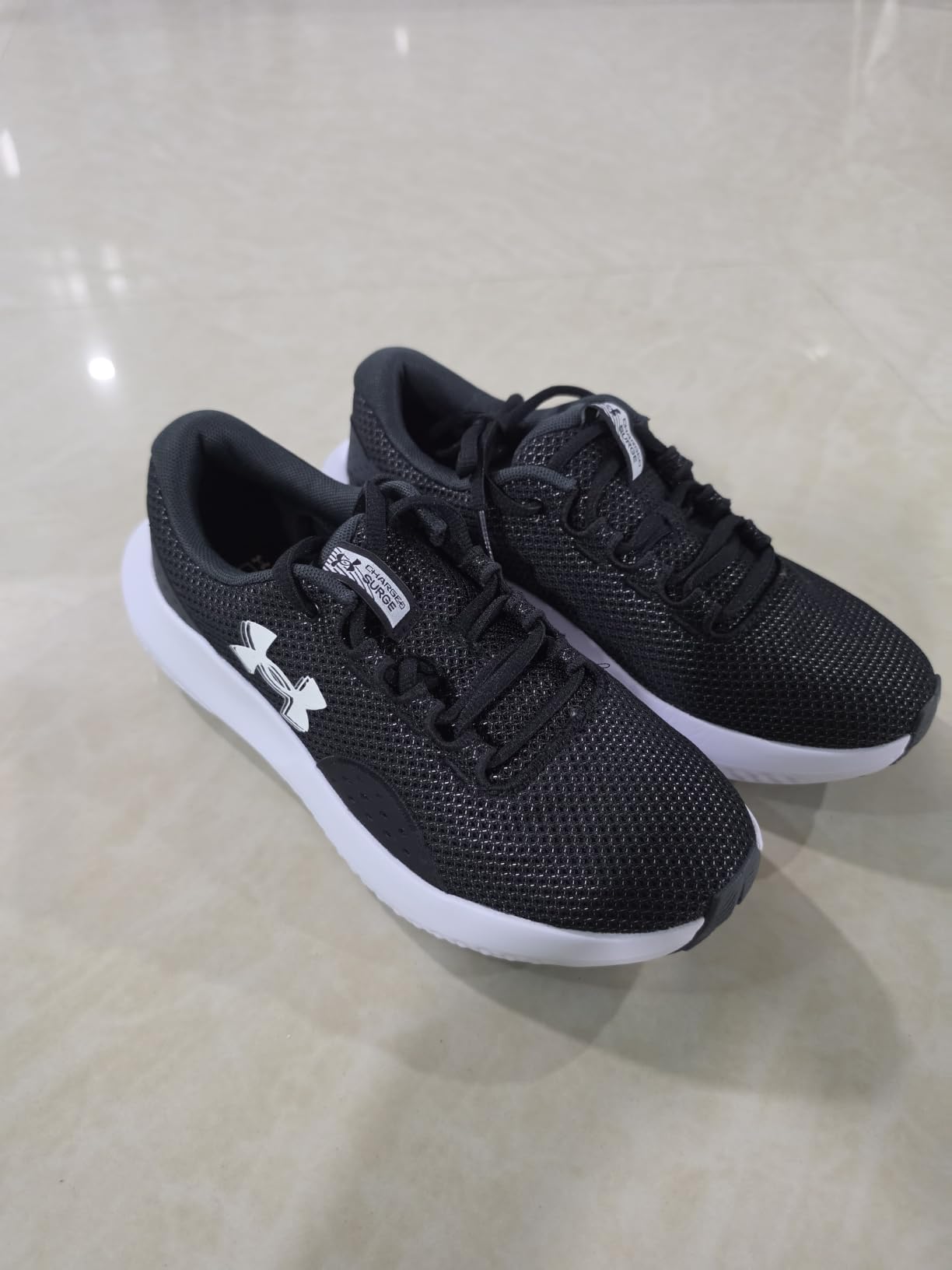 Under Armour Women's Charged Surge 4 Running Shoe customer photo 2