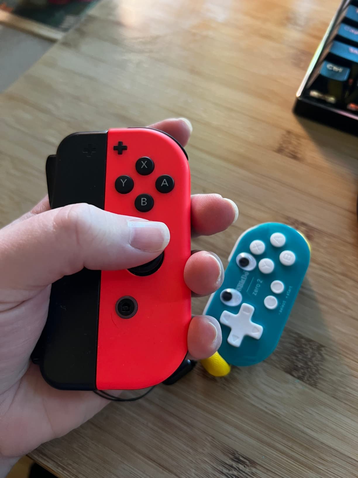 8Bitdo Zero 2 Bluetooth Gamepad Keychain Sized Mini Controller for Switch/Switch 2, Windows, Android (Yellow Edition) customer photo 2